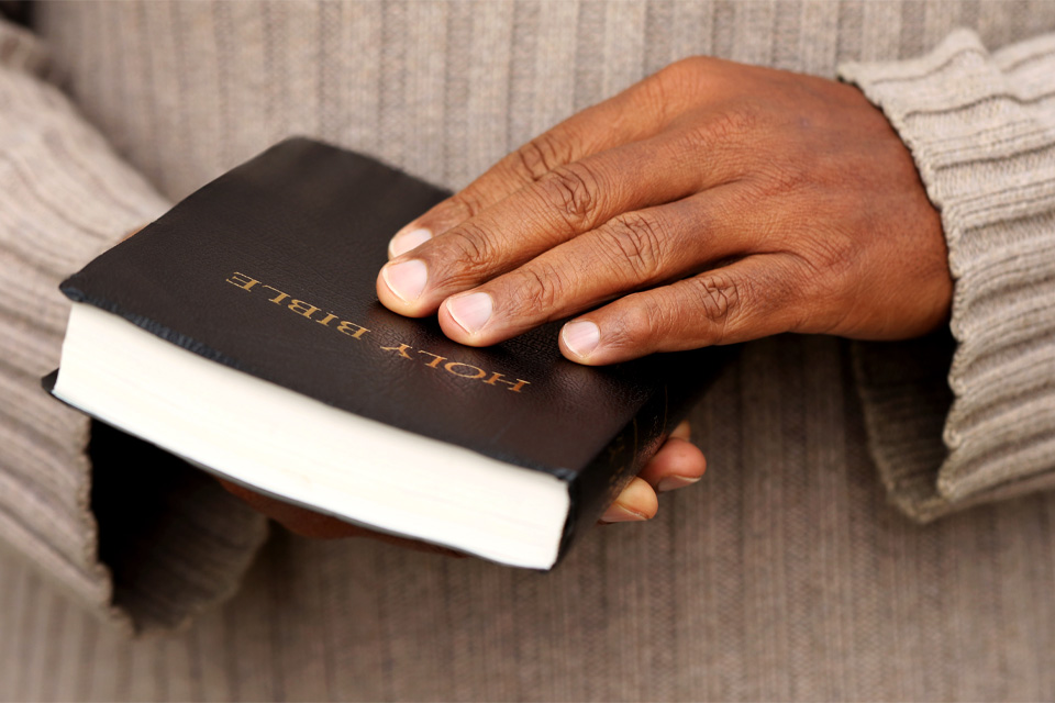 St. James A.M.E. Church hands holding Bible